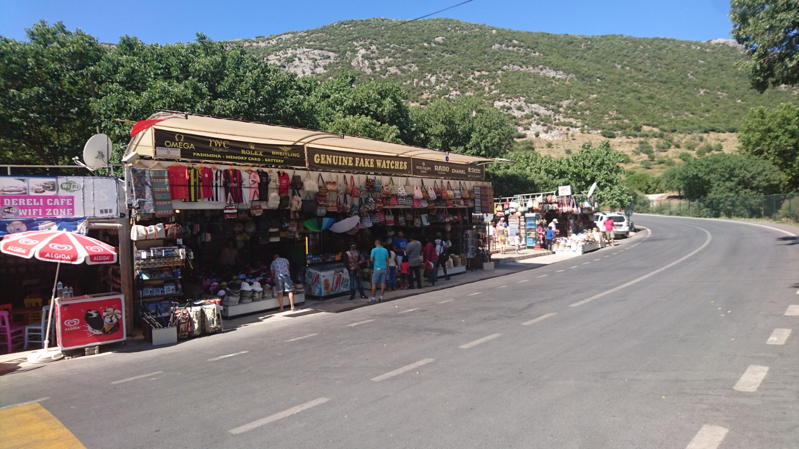 Roadside market near Izmir with genuine fake watches sign in Turkey